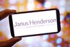 In this photo illustration, the Janus Henderson company logo