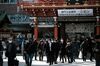 People walk inside the Kanda Myojin shrine on the first business day of the year in Tokyo, Japan, on Monday,Jan. 4, 2021. Japanese stocks declined on the first trading day of the year following reports of a state of emergency, with the benchmark Topix Index falling as much as 1.6%.