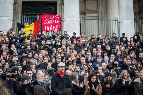 People gather at the Place de la Bourse.