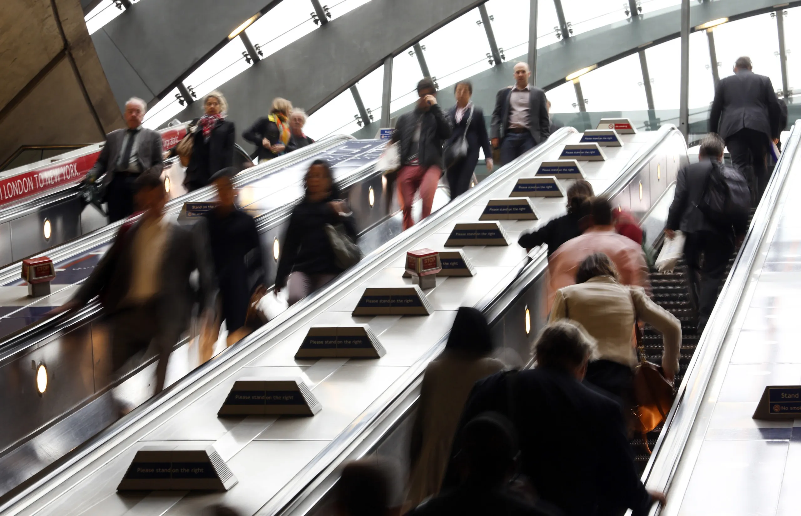 Commuters Arrive For Work At Canary Wharf London Underground Station