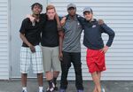 In this August 9, 2016 photo, James Edwards, right, poses for a photo with, from left, fellow residents Dujour Rice, Brandon David and Tyren Jones outside the Plymouth Crossroads youth homeless residence in Lancaster, N.Y., as Edwards prepared to leave for college.