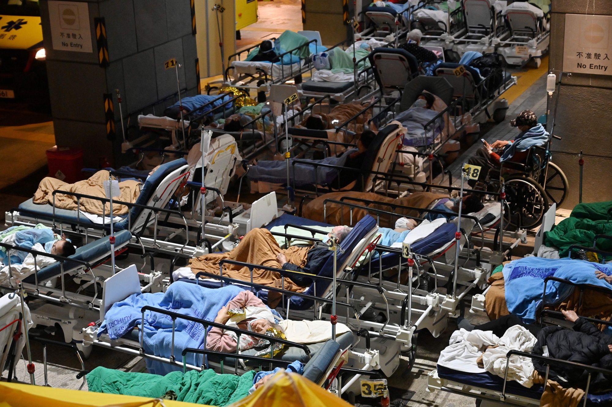 Hong Kong Covid Cases: Carrie Lam Seeks Property Tycoons' Help to House  Patients - Bloomberg