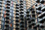 Balconies sit on the outside of residential flats near the Canary Wharf financial, business and shopping district in London, U.K., on Tuesday, July 25, 2017. U.K. house prices are "virtually at a standstill" as consumers contend with a squeeze on living standards, Rightmove Plc said.