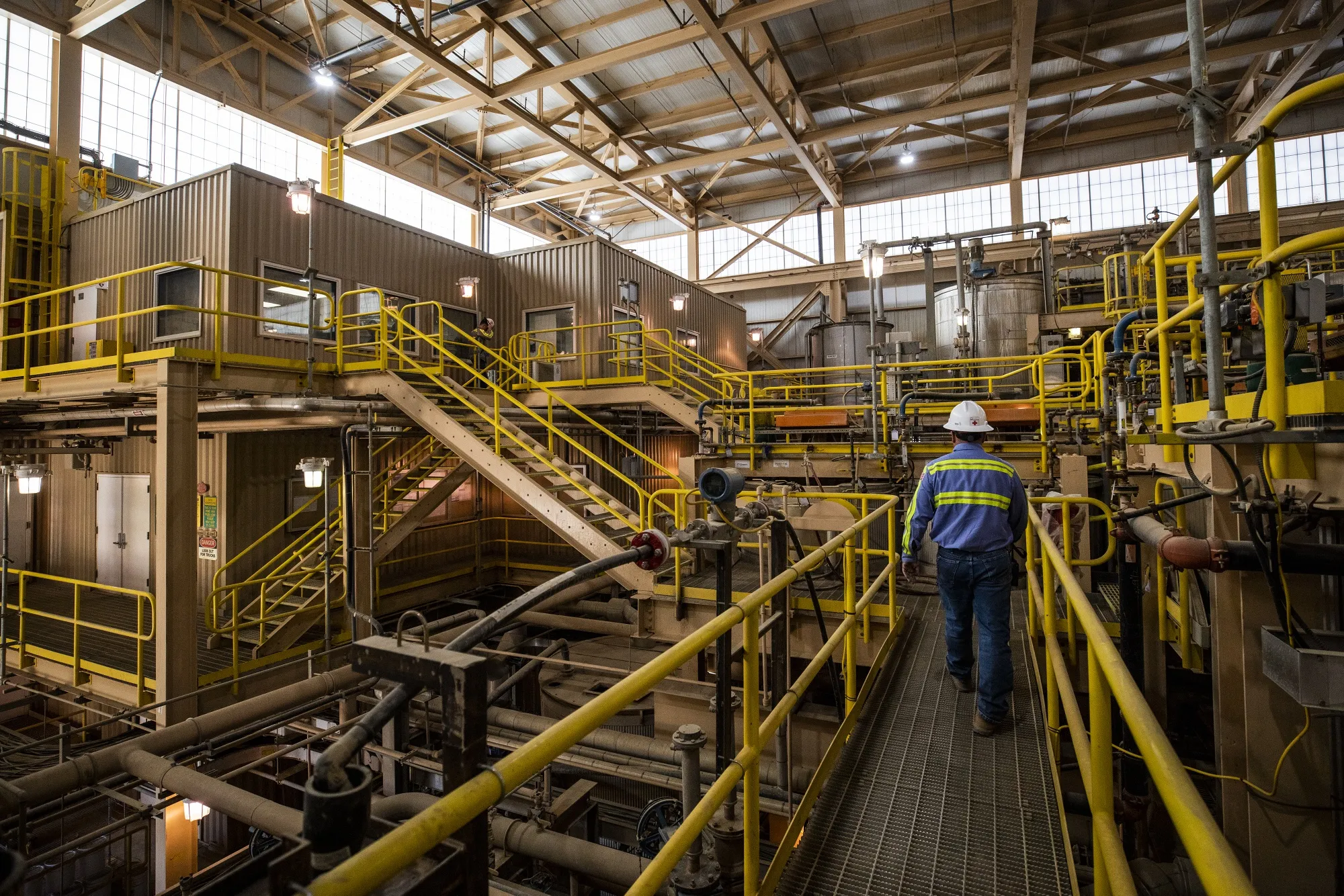 An employee walks through the processing facility at a rare earths mine in Mountain Pass, California.