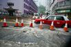 Rainwater surges from a drain on Wo Yi Hop Road in Hong Kong, on Aug. 5.