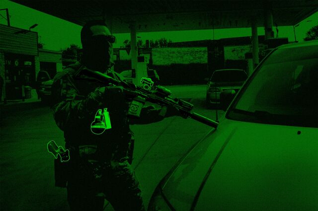 An immigration officer in tactical gear while patrolling in Chicago