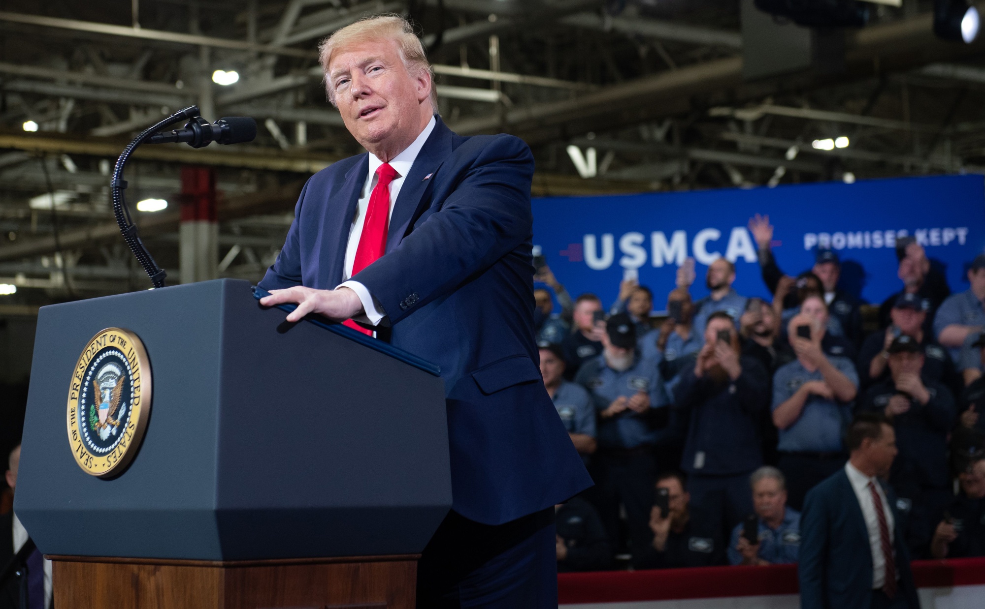 US President Donald Trump speaks about the United States - Mexico - Canada agreement, known as USMCA, during a visit to Dana Incorporated, an auto supplier manufacturer, in Warren, Michigan, on Jan. 30, 2020. Photographer: Saul Loeb/AFP/Getty Images