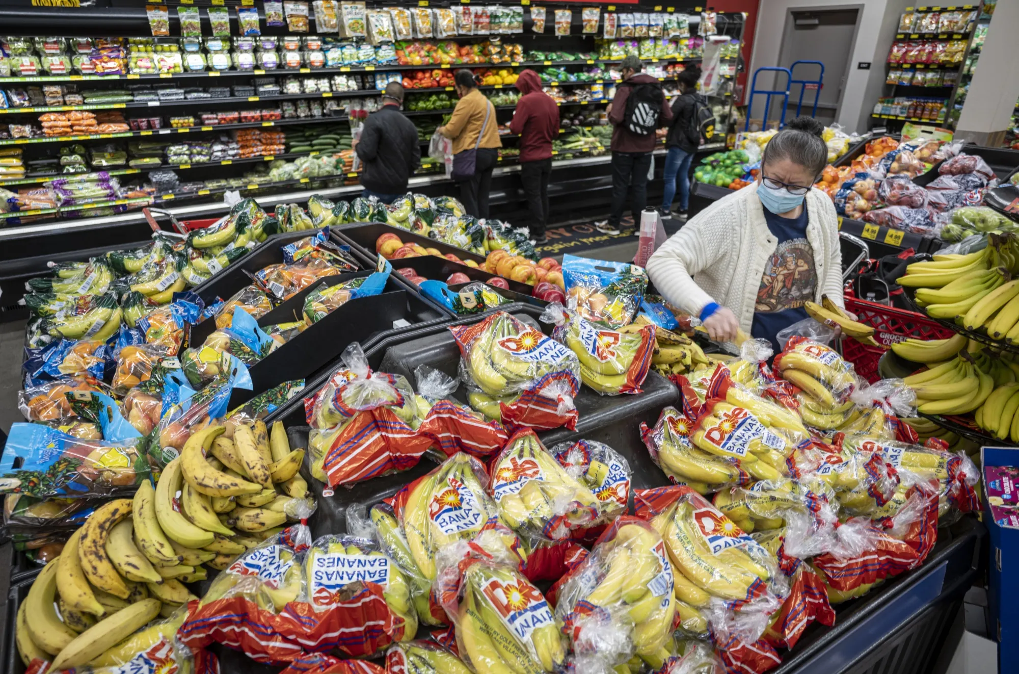 Customers shop for groceries at a store in San Francisco, California, U.S.