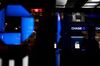 JPMorgan Chase & Co. signage is illuminated at night at a bank branch in Chicago, Illinois, U.S., on Tuesday, July 10, 2017.