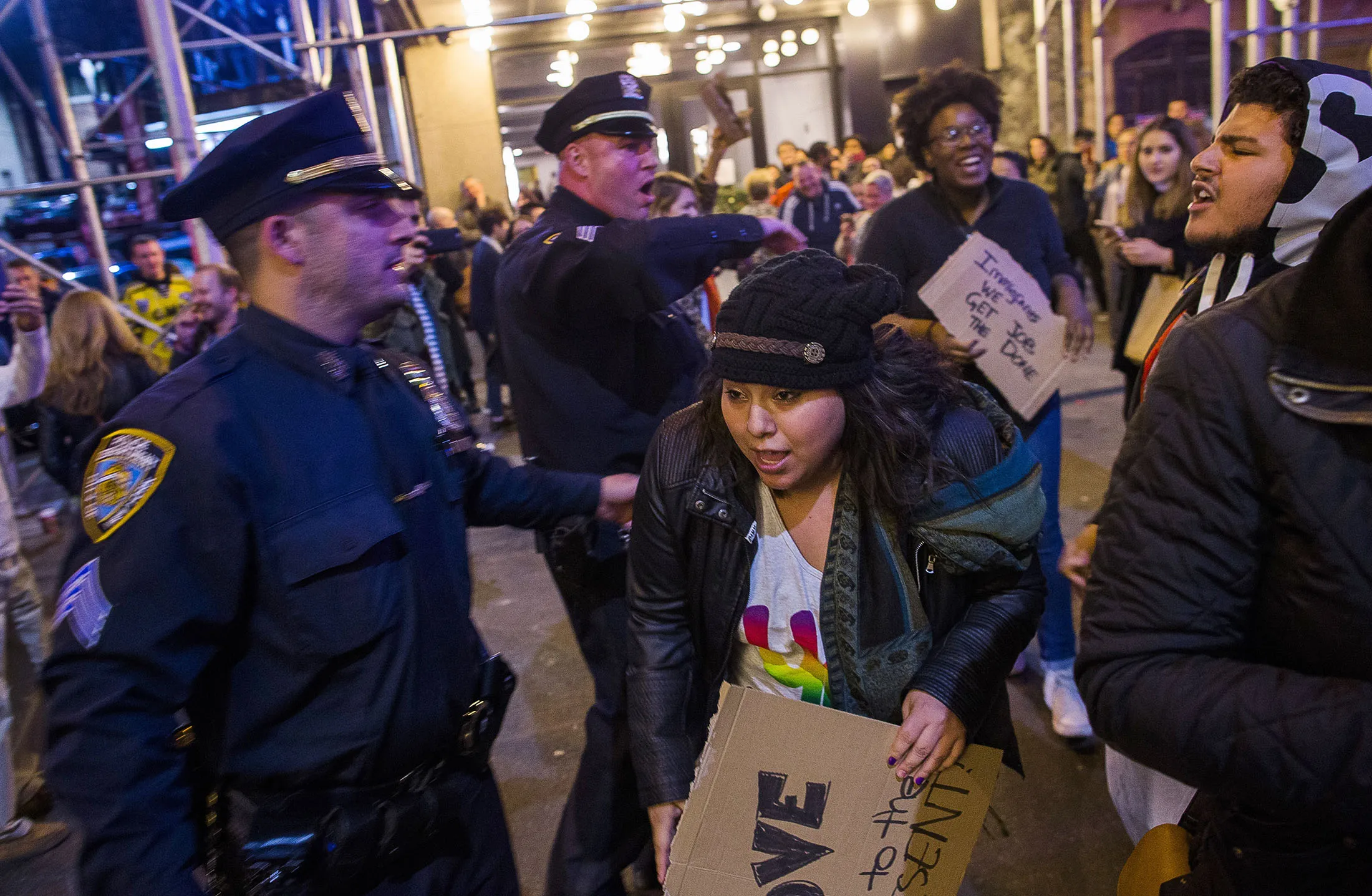Police remove protesters from the streets after they shouted slogans at Vice President-elect Mike Pence whilst leaving the Richard Rodgers Theatre after a performance of 'Hamilton,' in New York on Nov. 18.
