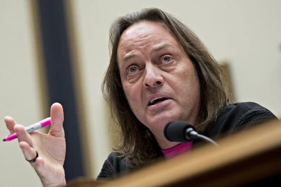 T-Mobile's Legere Fends Off Trump Hotel Criticism From Democrats