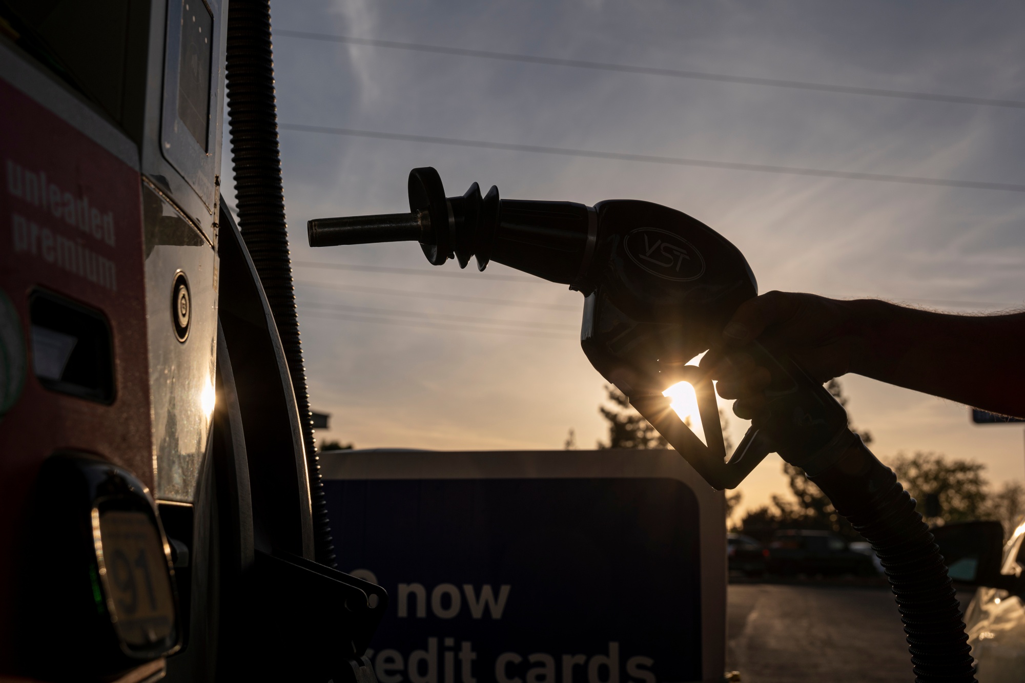 A driver refuels at a gas station in Sacramento, California.