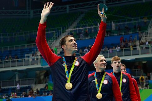 1470804111_phelps swimming 21 gold