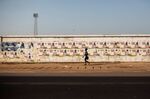 Election campaign posters in Bissau, in Guinea-Bissau on Nov. 23.