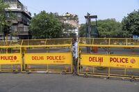 Delhi Police block a street during lockdown restrictions in New Delhi, on May 5.