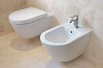 A matching bidet and toilet