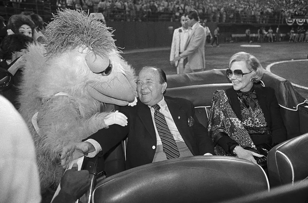 Ray and Joan Kroc are honored by their San Diego Padres (and the Famous Chicken) at a home game in 1982.
