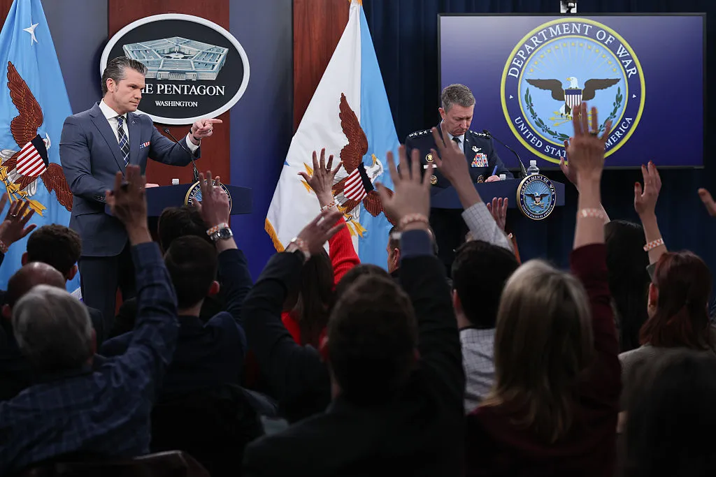 Pete Hegseth calls on a reporter while answering questions during a press briefing at the Pentagon on March 19.