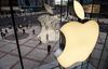 BEIJING, CHINA - JANUARY 07: The Apple logo is seen on the window at an Apple Store on January 7, 2019 in Beijing, China. Apple Inc. lowered its revenue guidance last week, blaming China's slowing economy and weaker than expected iPhone sales, as the company's chief executive officer Tim Cook said in a letter to investors the sales problems were primarily in its Greater China region that accounts for almost 20 percent of its revenue and includes Hong Kong and Taiwan. (Photo by Kevin Frayer/Getty Images)