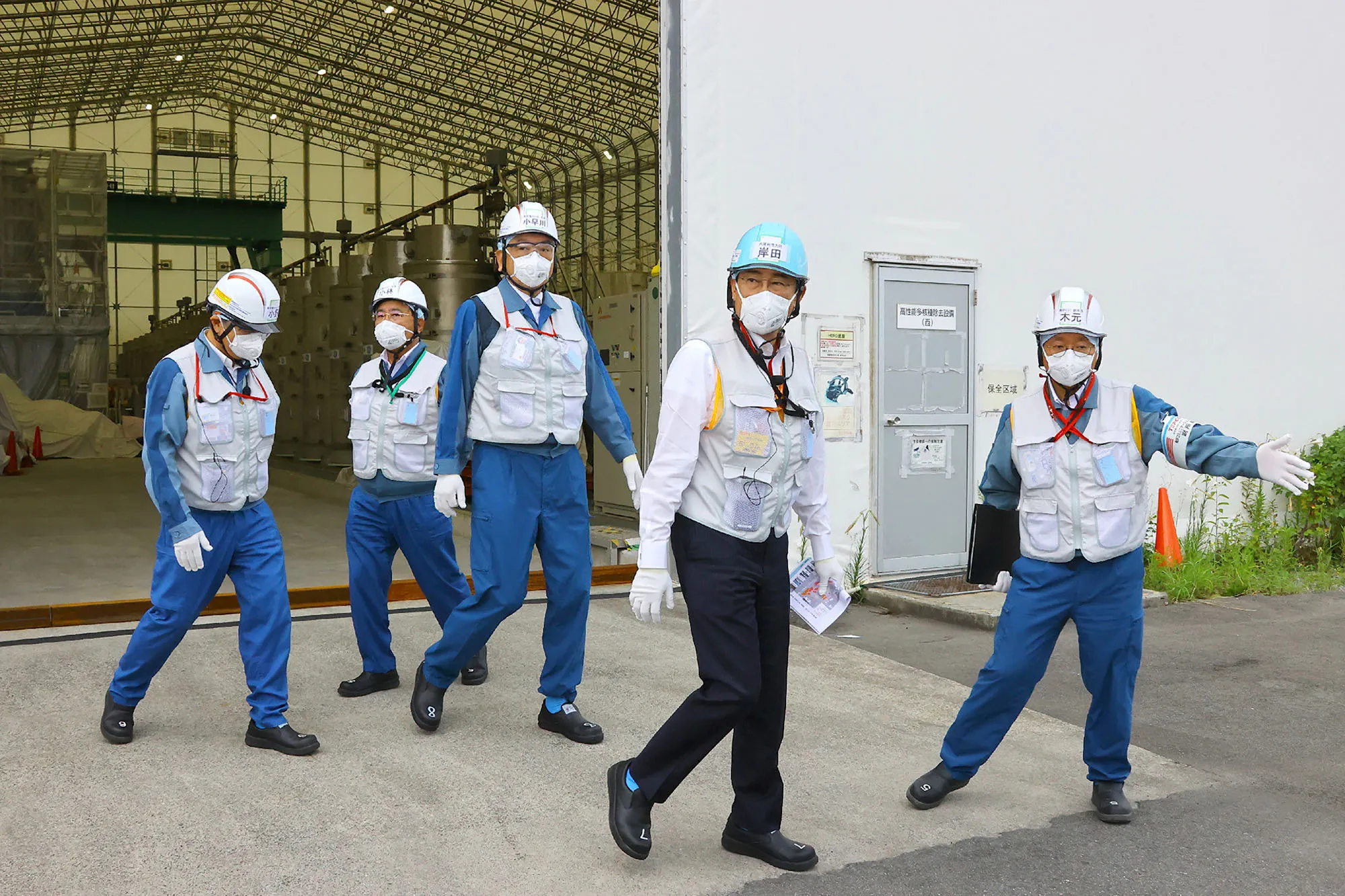 Fumio Kishida, seocnd right, visits the Tokyo Electric Power Co. (TEPCO) Fukushima Daiichi nuclear power plant in Fukushima Prefecture, Japan&nbsp;on Aug. 20, 2023.