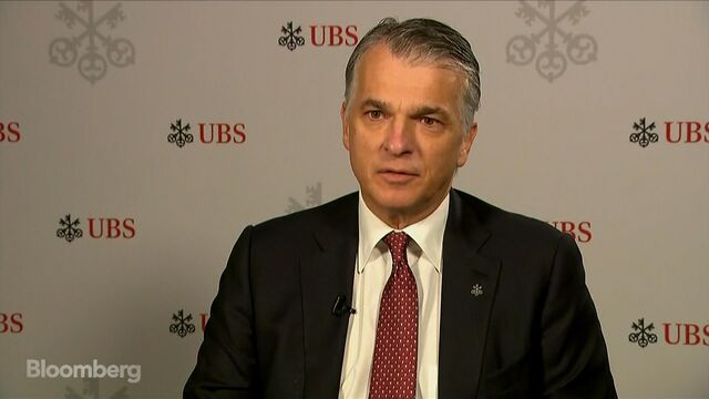 UBS to buy back stock and merge its two wealth management businesses UBS to buy back stock and merge its two wealth management businesses