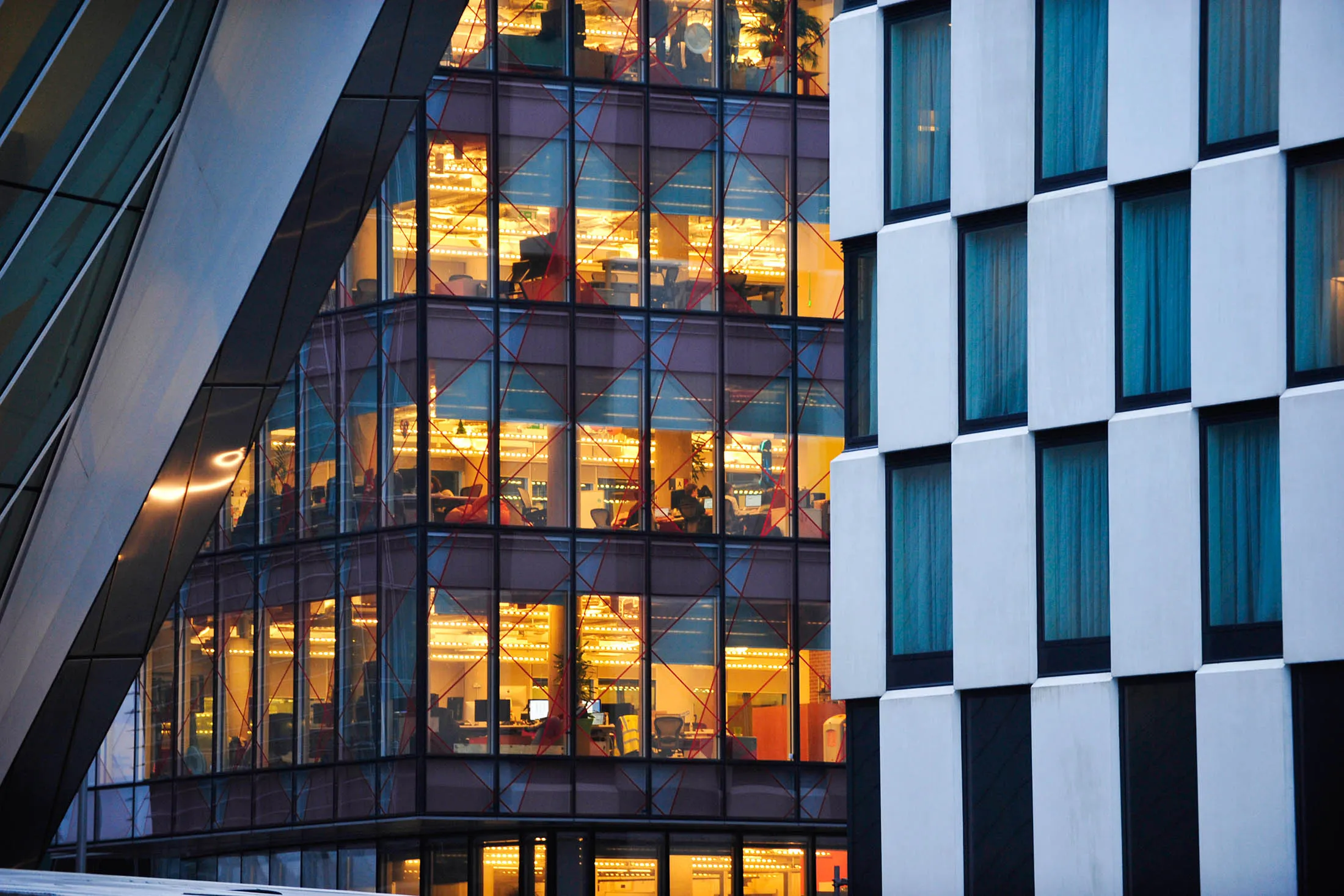 Employees work in the offices of Facebook Inc's European headquarters in the Dublin dockland development in Dublin, Ireland, on Tuesday, Feb. 9, 2016. Low corporate taxes are the cornerstone of Irish economic policy, and all four of the biggest political parties have promised to keep the 12.5 percent rate.
