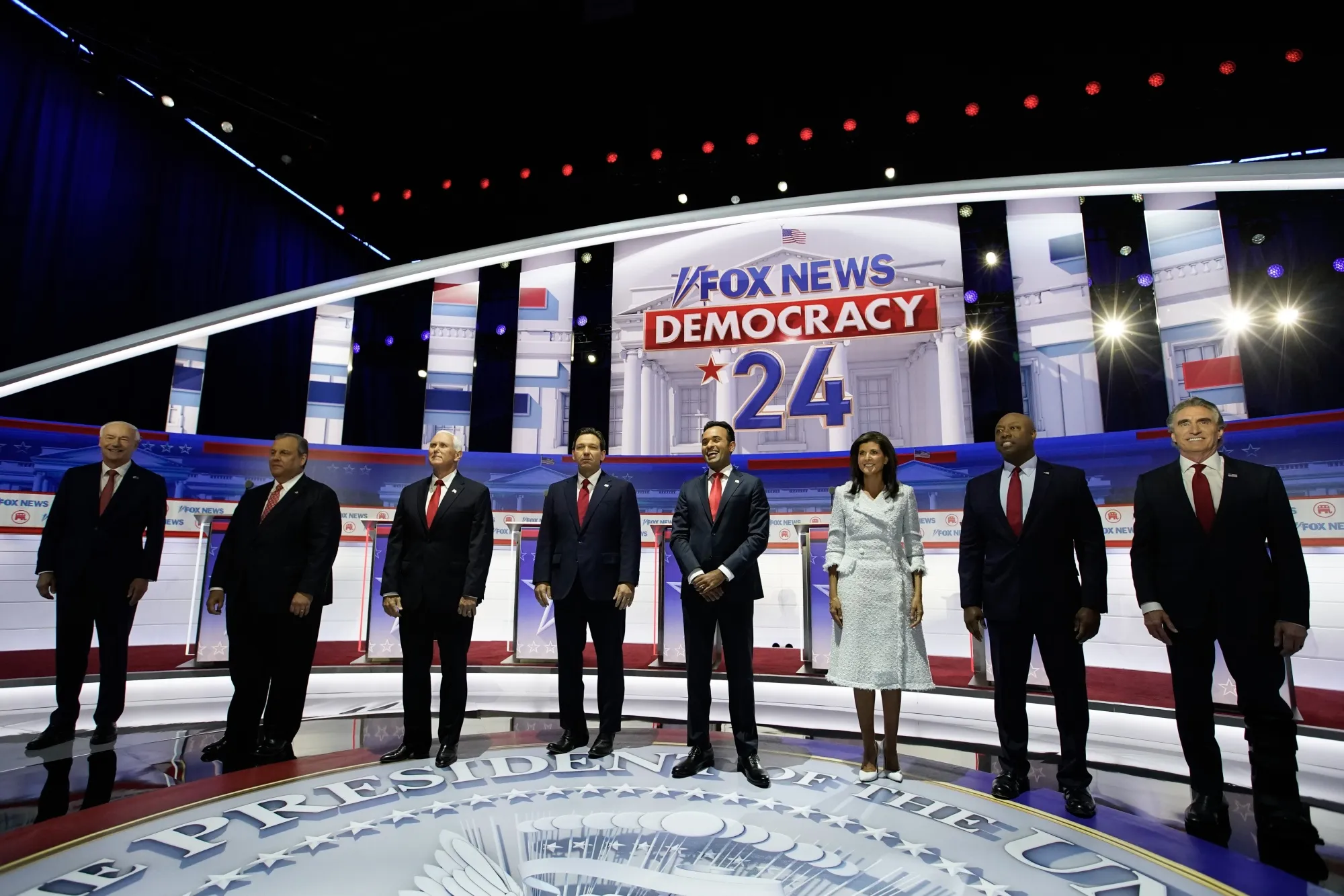 2024 Republican presidential candidates Asa Hutchinson, from left, Chris Christie, former Vice President Mike Pence, Governor Ron DeSantis, Vivek Ramaswamy, Nikki Haley, Senator Tim Scott and Governor Doug Burgum during the Republican primary presidential debate&nbsp;on&nbsp;Aug. 23, 2023.&nbsp;