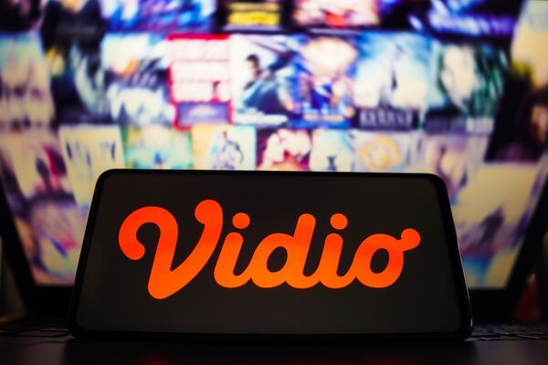 In this photo illustration, the Vidio logo is displayed on a