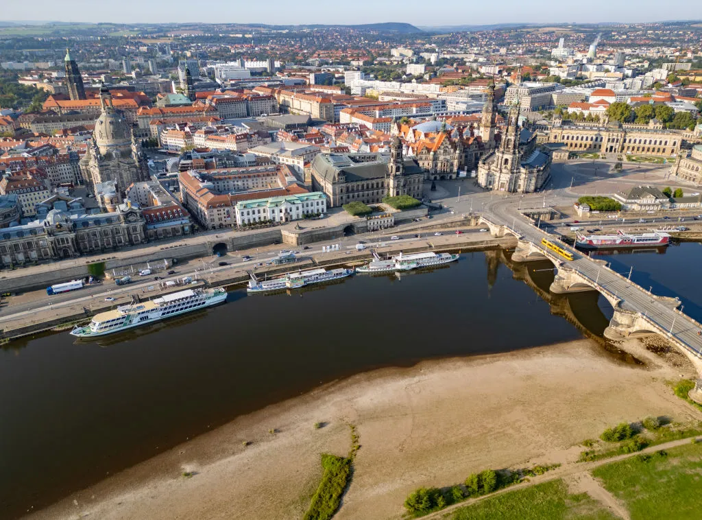 The dry banks of the Elbe and the Augustus Bridge, in Dresden.