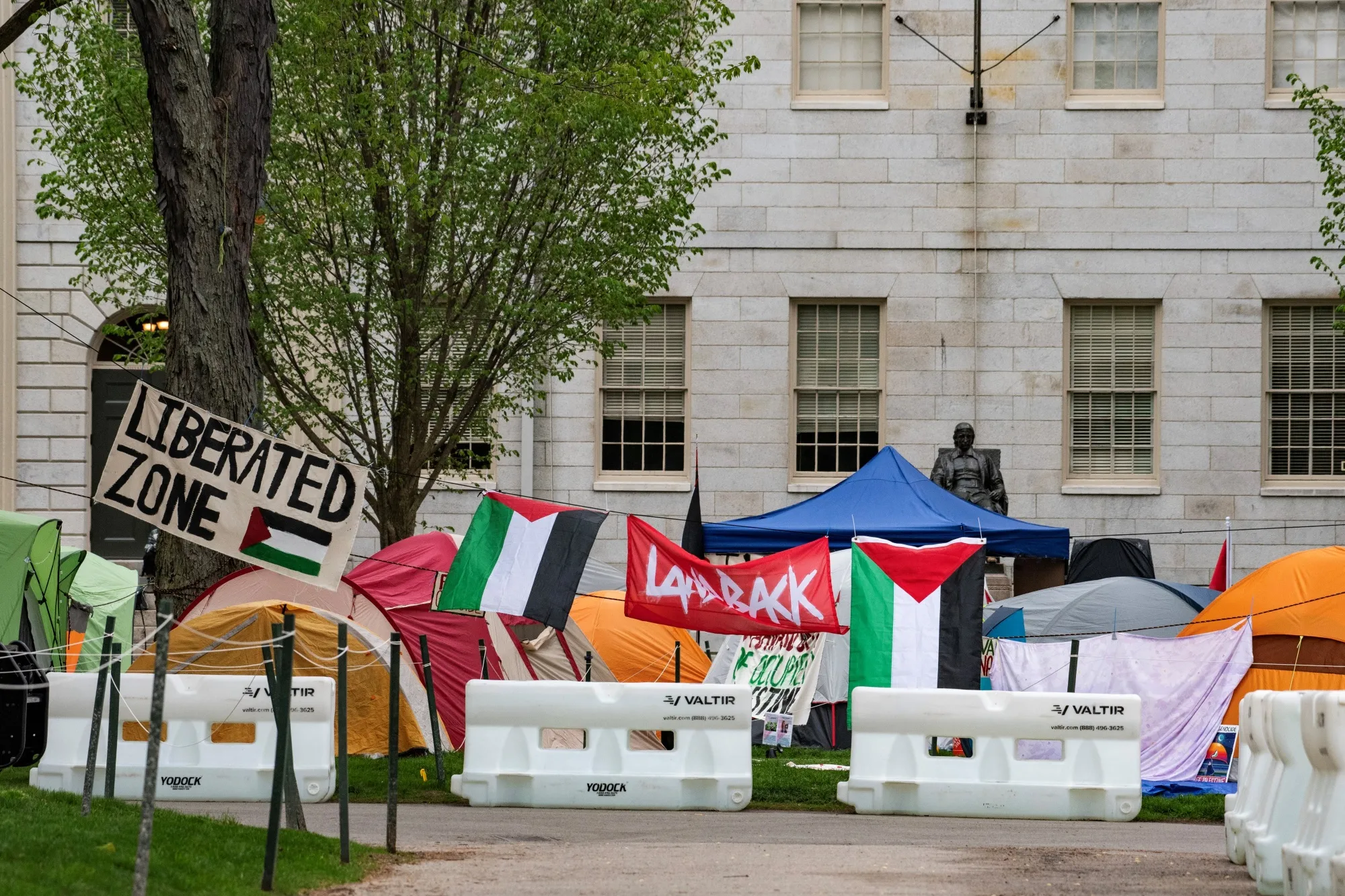 Tents and signs in the Pro-Palestinian encampment at Harvard University in Cambridge, Massachusetts on May 5.