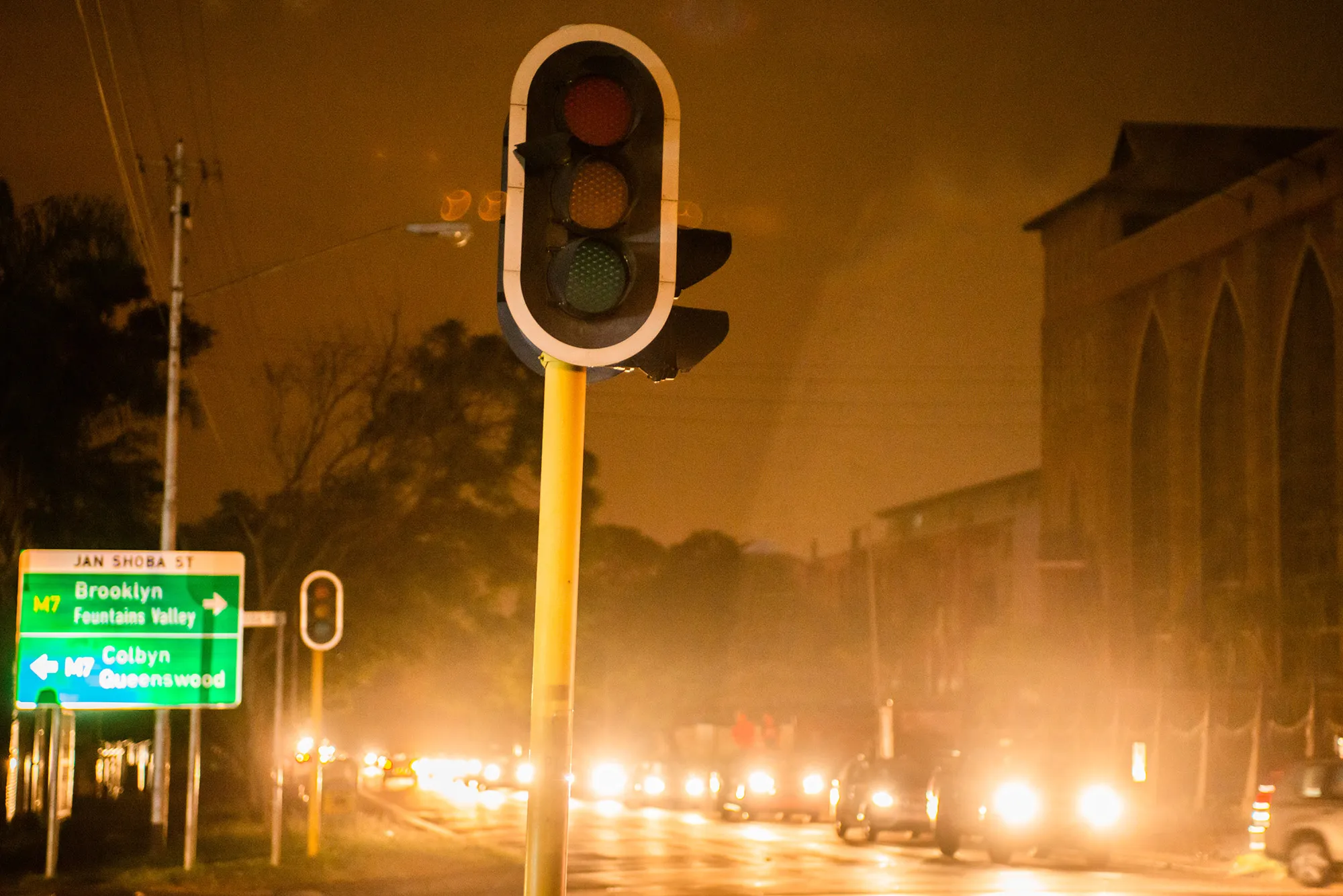 Slow-moving vehicles line the streets as traffic lights stand without power during a load-shedding power outage in Pretoria.