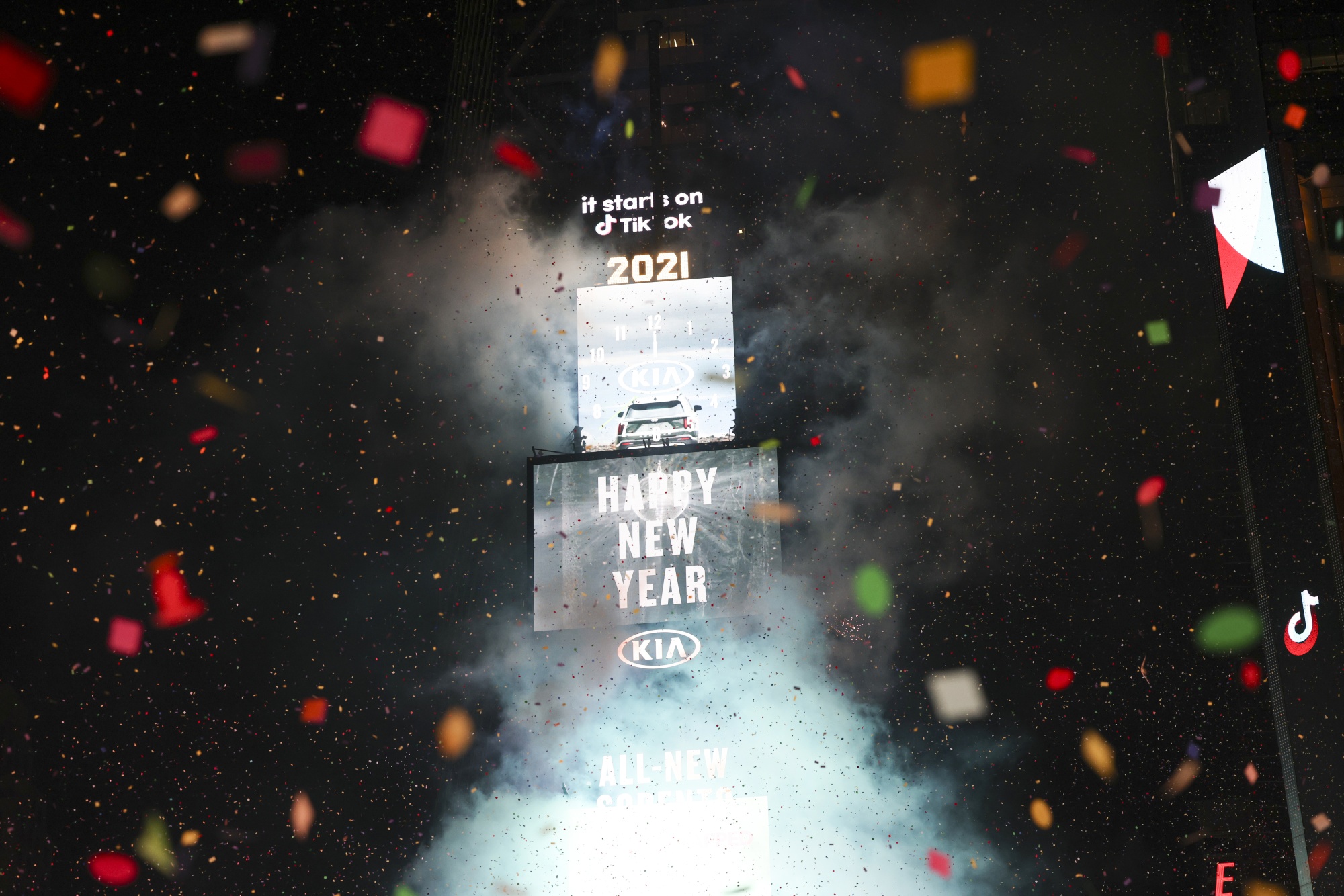 Confetti falls at midnight during a virtual New Year's Eve celebrations in the Times Square area of New York, U.S., on Friday, Jan. 1, 2021. 