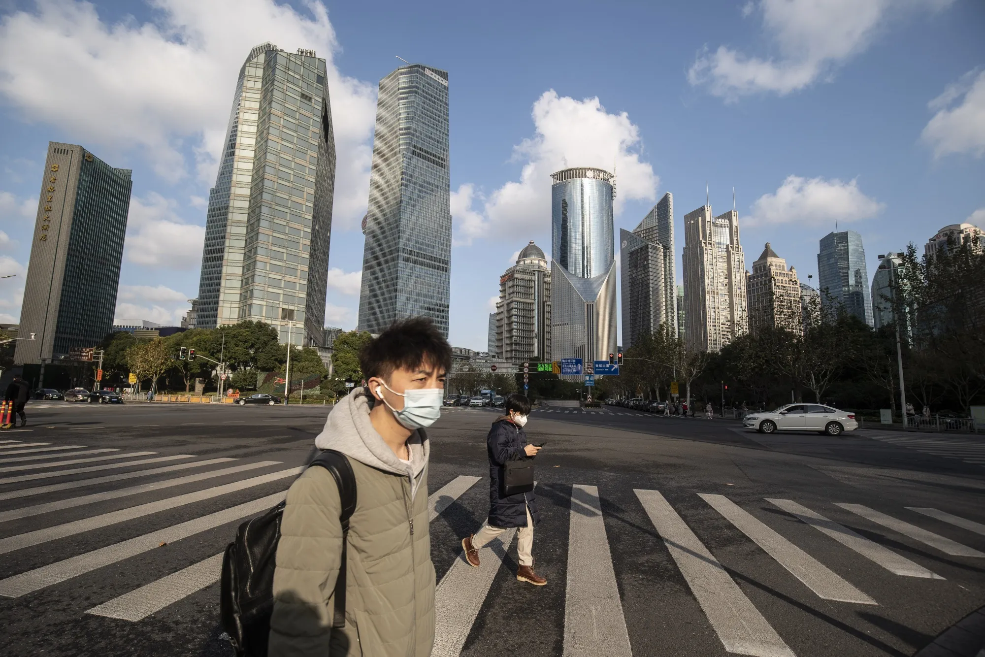 Pedestrians in Shanghai’s financial district on Jan. 3.