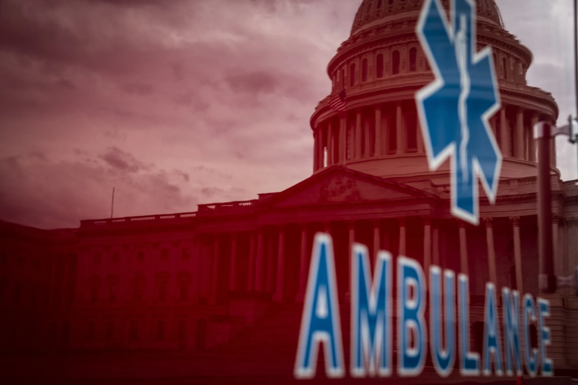 The U.S. Capitol is reflected on the side of an ambulance in Washington, D.C. on April 21, 2020.&nbsp;
