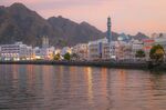 Pastel twilight over Muscat harbour, Oman.
