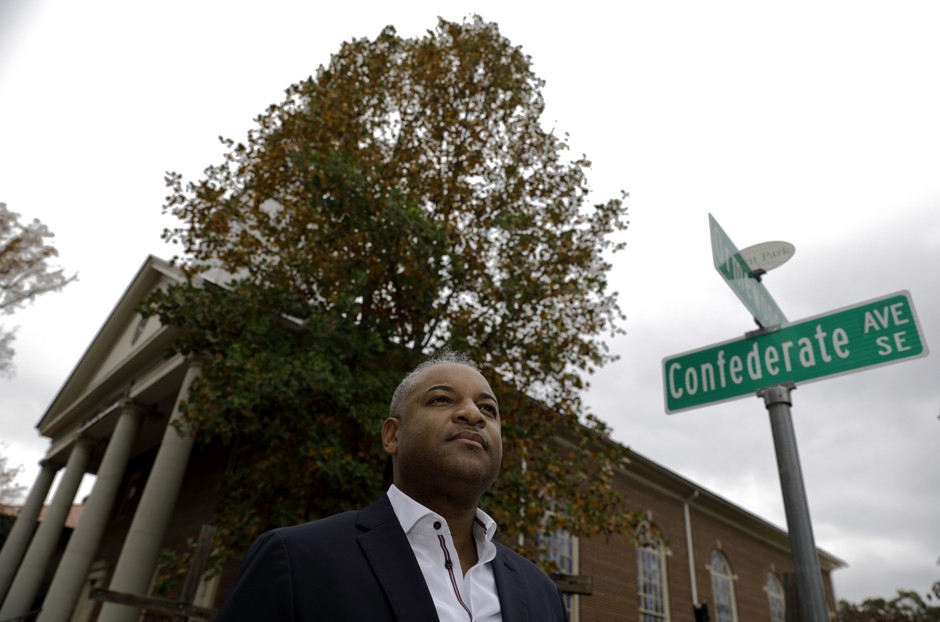 Bishop O.C. Allen III stands outside his church, a few feet away from Confederate Avenue in Atlanta.