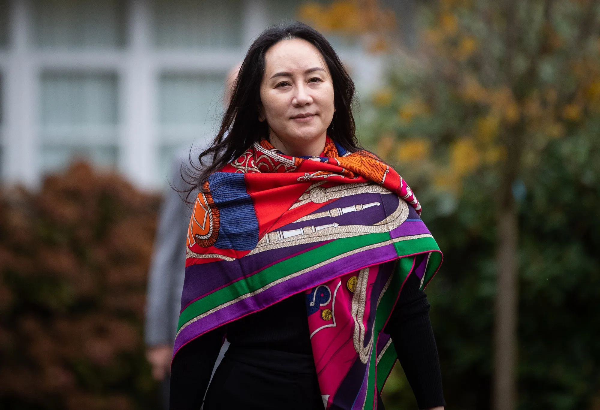 Meng Wanzhou leaves her home to attend Supreme Court for a hearing, in Vancouver on Oct. 29.