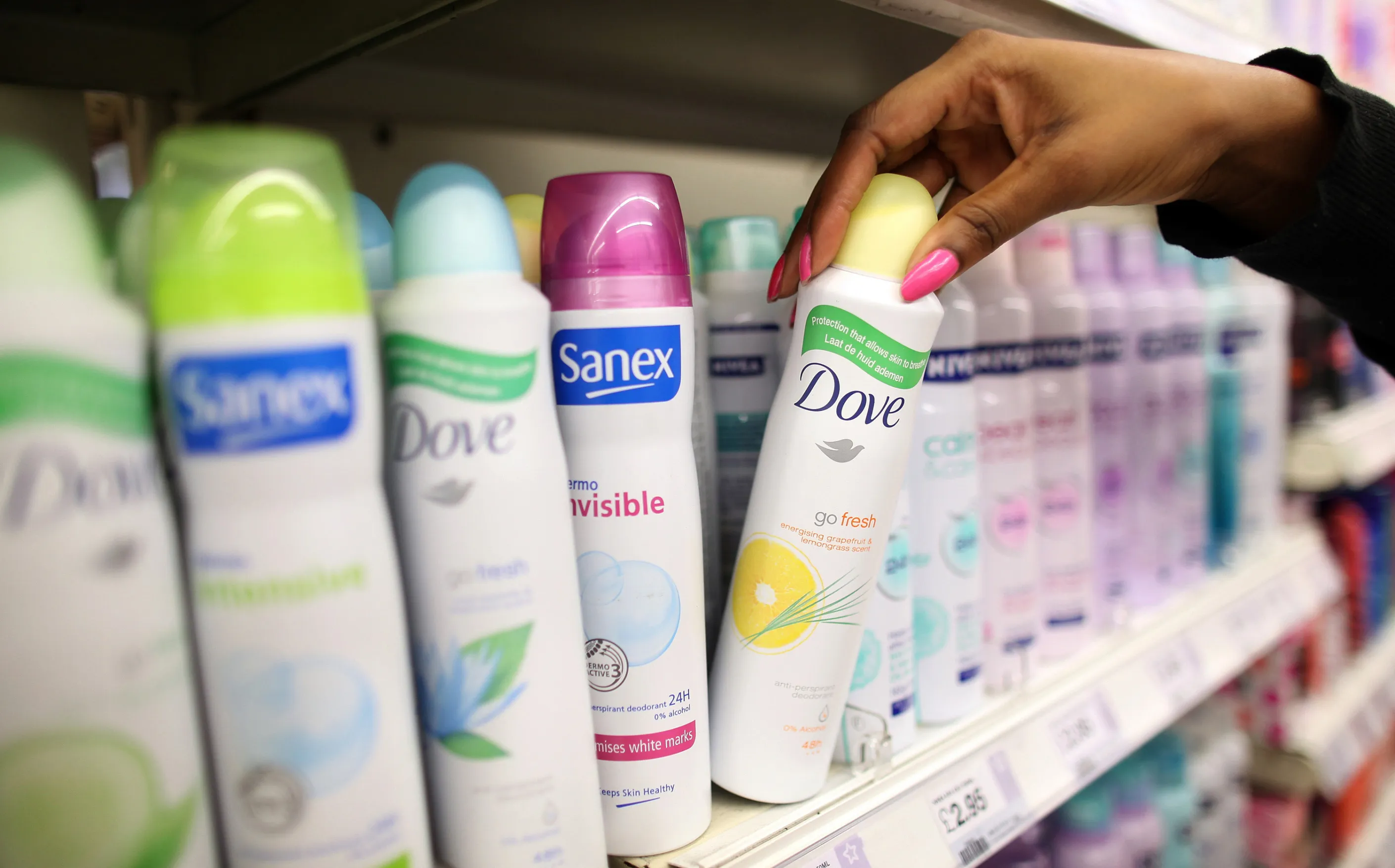 Cans of Dove deodorant, produced by Unilever Plc., at a supermarket in London.