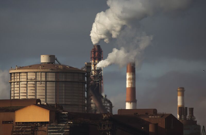 Emissions rise from chimneys at the Nippon Steel & Sumitomo Metal Corp. plant in Kashima, Japan.