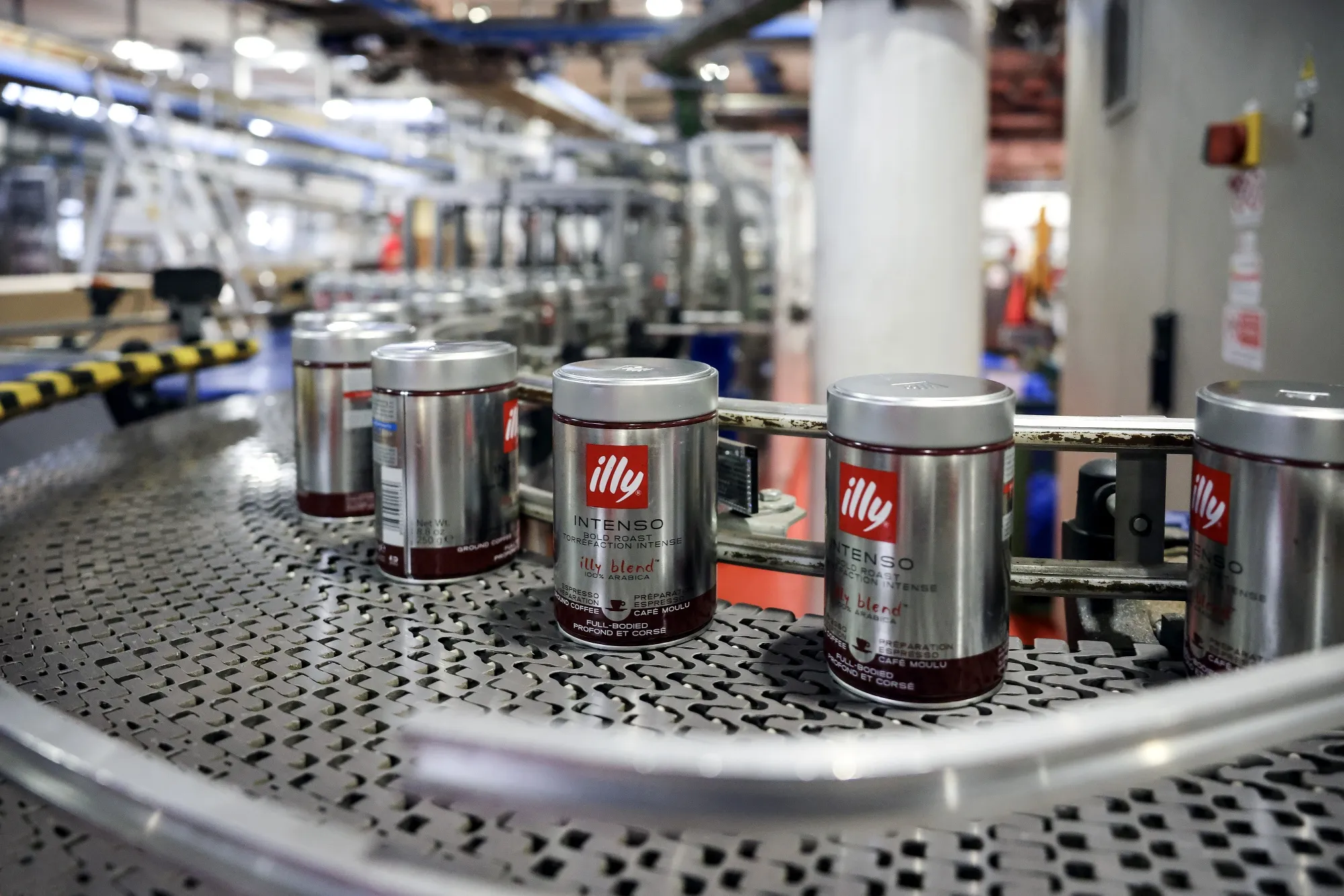 Cans&nbsp;of Illycaffe ground coffee on the production line in Trieste, Italy.