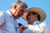 Cuban leader Raúl Castro (right) talks with&nbsp;Vice President Miguel Díaz-Canel while watching a parade in Havana’s Revolutionary Square on May 1, 2016.&nbsp;