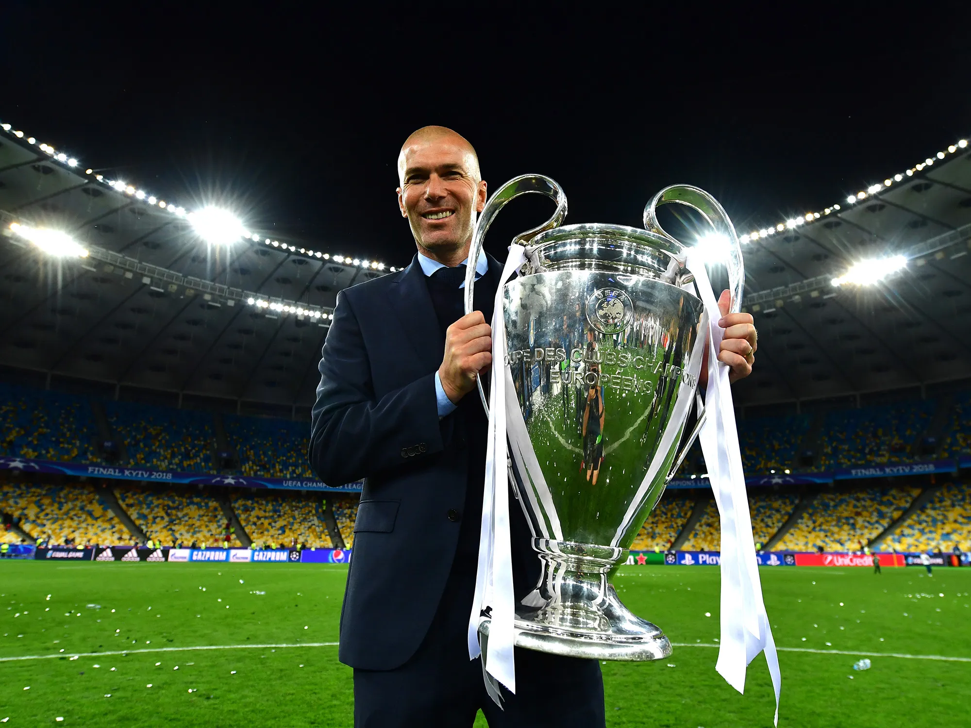 Zinedine Zidane&nbsp;celebrates with the&nbsp;UEFA Champions League trophy on May 26.