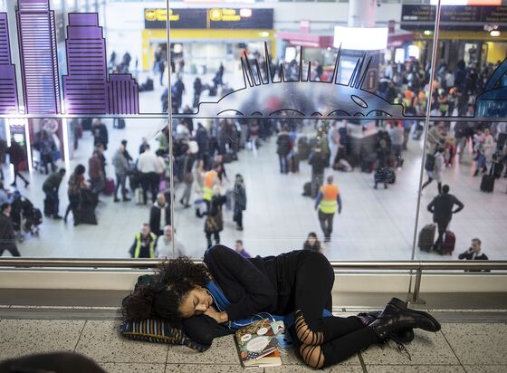 At London Gatwick, Glum Faces and Crying Kids Amid Drone Mess