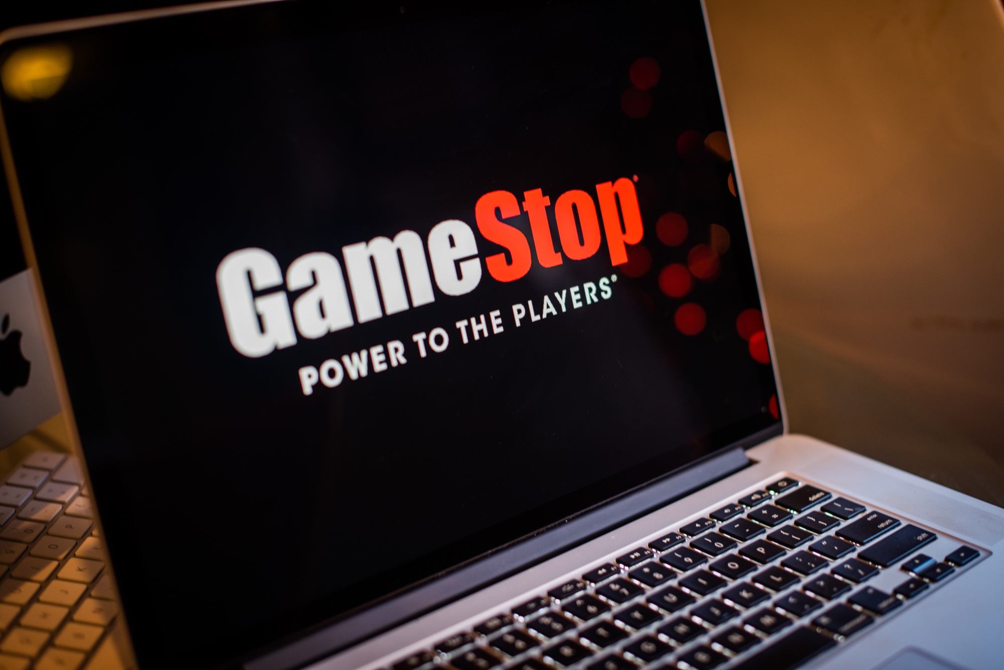 The GameStop Corp. logo on a laptop computer arranged in Hastings-On-Hudson, New York, U.S., on Friday, Jan. 29, 2021. GameStop Corp. advanced on Friday and was on track to recoup much of Thursdays $11 billion blow after Robinhood Markets Inc. and other brokerages eased trading restrictions on the video-game retailer.