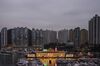 A boat sails past the illuminated Jumbo Floating Restaurant at the Aberdeen South Typhoon Shelter at dusk in Hong Kong, China, on Friday, Jan. 17, 2020.