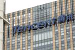 Signage for Tencent Holdings Ltd. atop an office building in Shanghai, China, on Tuesday, March 22, 2022.
