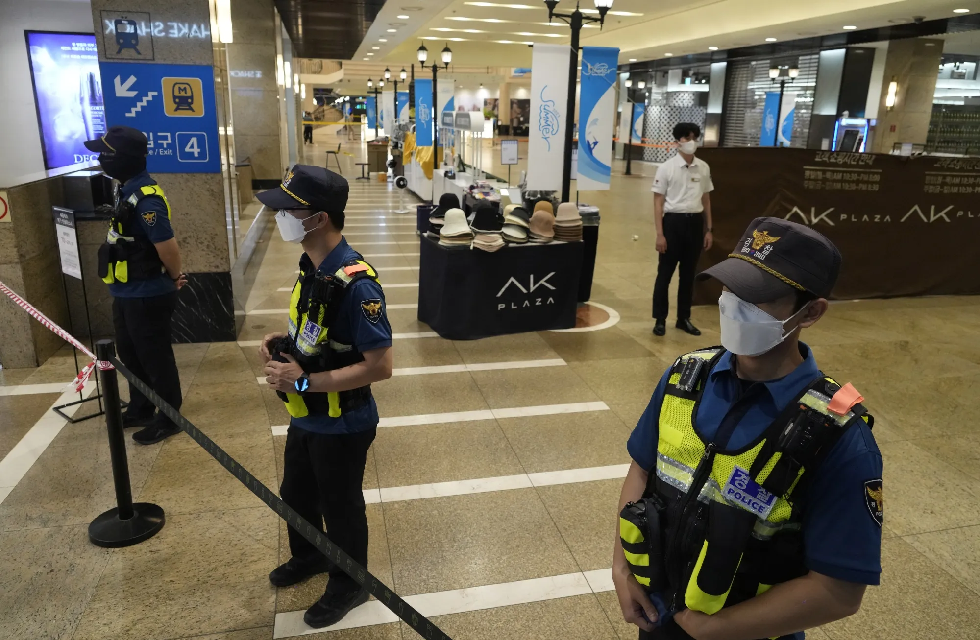 Police officers cordon off the scene near a subway station in Seongnam on Aug. 3.