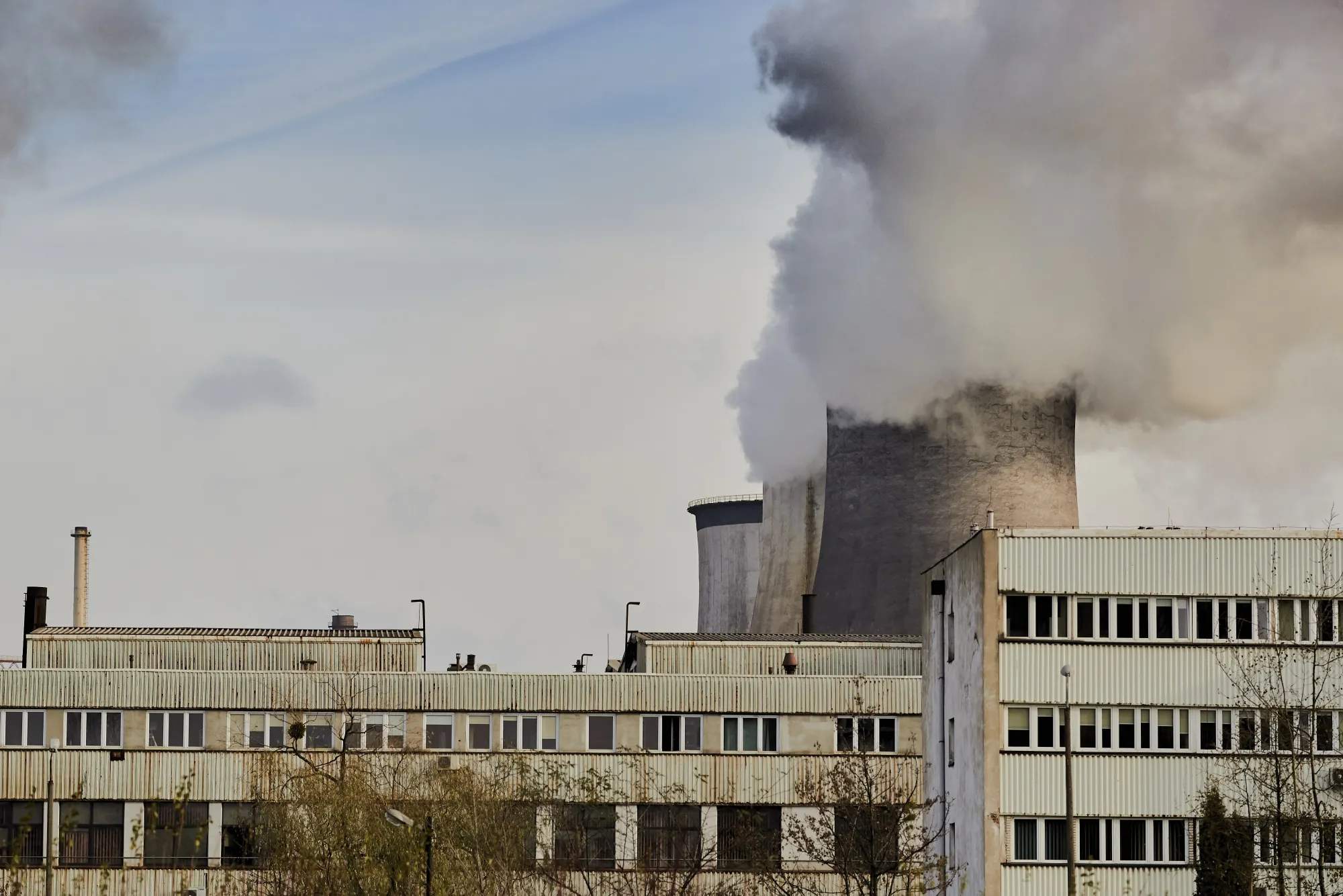 Vapor rises from the cooling towers at the Huta Katowice steel plant in Dabrowa Gornicza, Poland.