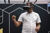 An attendee uses a hand tracking feature with Facebook's Oculus Quest VR headset during the Oculus Connect 6 conference in San Jose, California, on Sept. 26, 2019. 