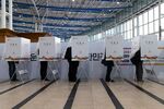 Voters at an early polling location for the presidential election inside Seoul Station on March 4.